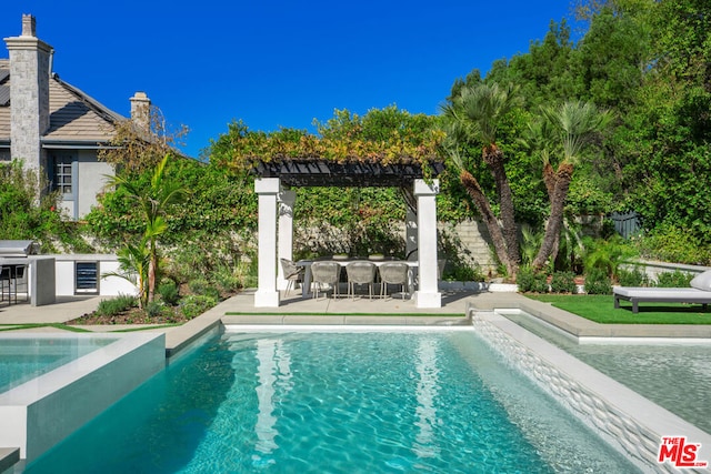 view of swimming pool featuring a pergola, grilling area, and a patio