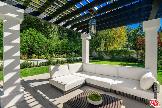 view of patio with an outdoor living space and a pergola