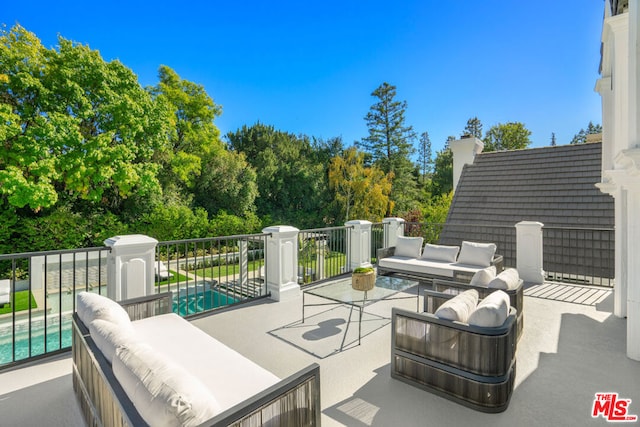 view of patio / terrace with outdoor lounge area and a fenced in pool