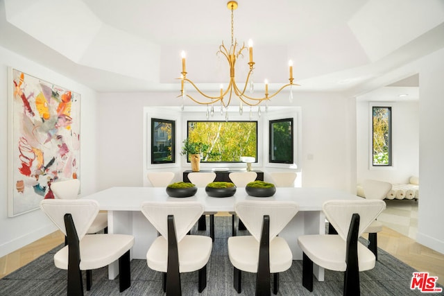 dining space featuring a chandelier