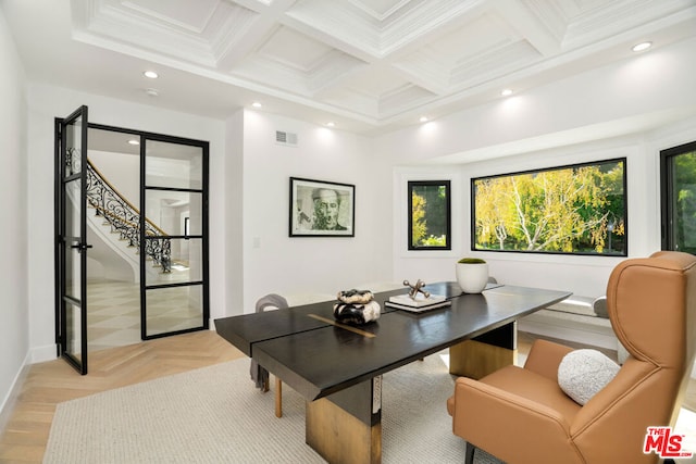 office area with light parquet flooring, beamed ceiling, coffered ceiling, and ornamental molding