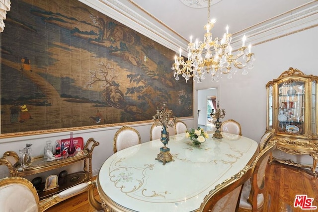 dining area with an inviting chandelier and hardwood / wood-style flooring