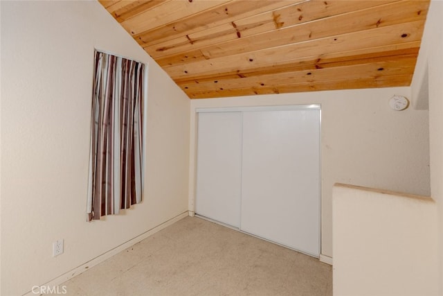 bonus room featuring vaulted ceiling and wooden ceiling