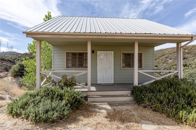 entrance to property with covered porch