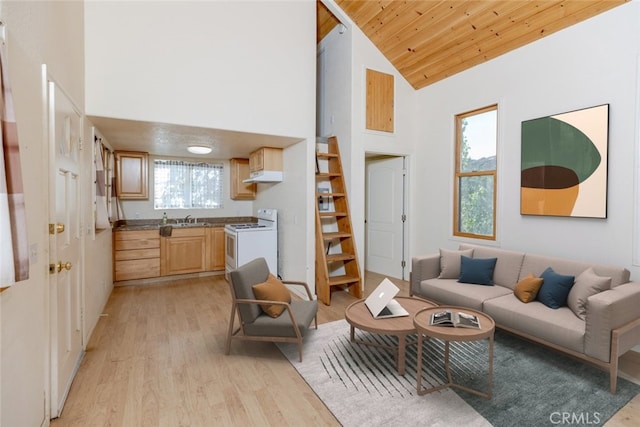 living room with sink, light hardwood / wood-style flooring, high vaulted ceiling, and wood ceiling