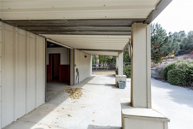 view of patio featuring a carport