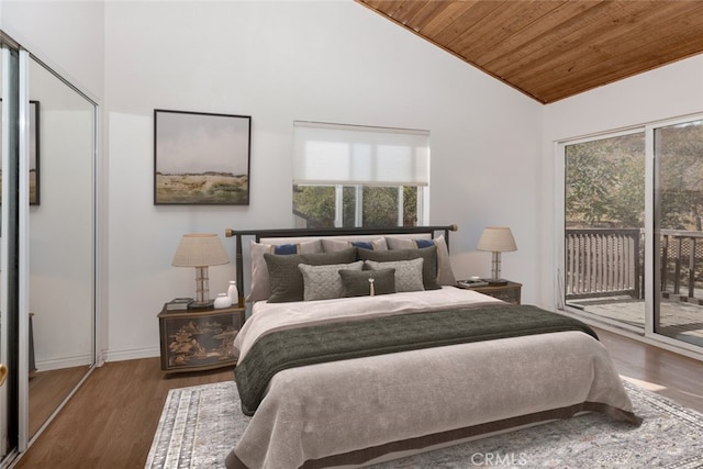 bedroom featuring access to outside, dark wood-type flooring, high vaulted ceiling, and wooden ceiling