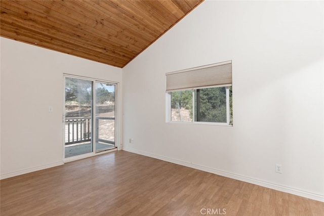 unfurnished room featuring hardwood / wood-style floors, wood ceiling, and high vaulted ceiling