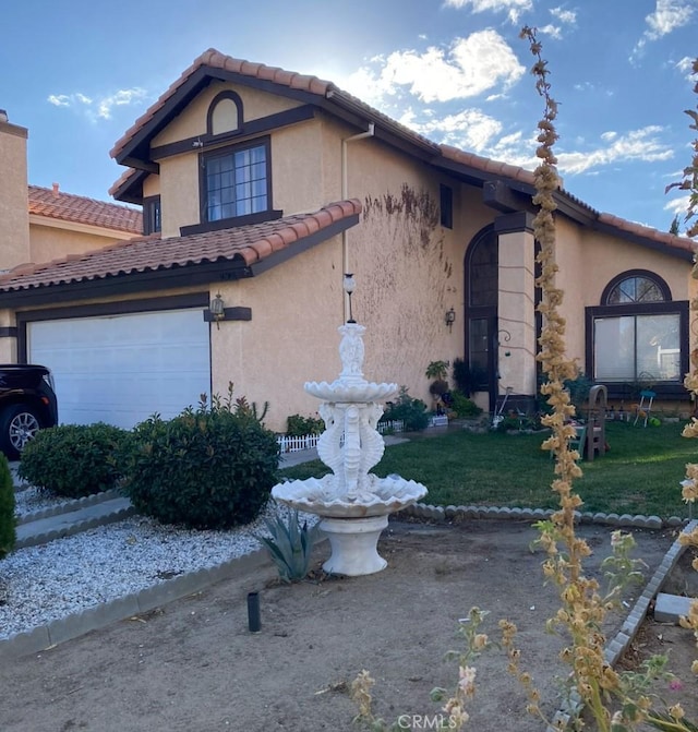 view of side of home with a garage