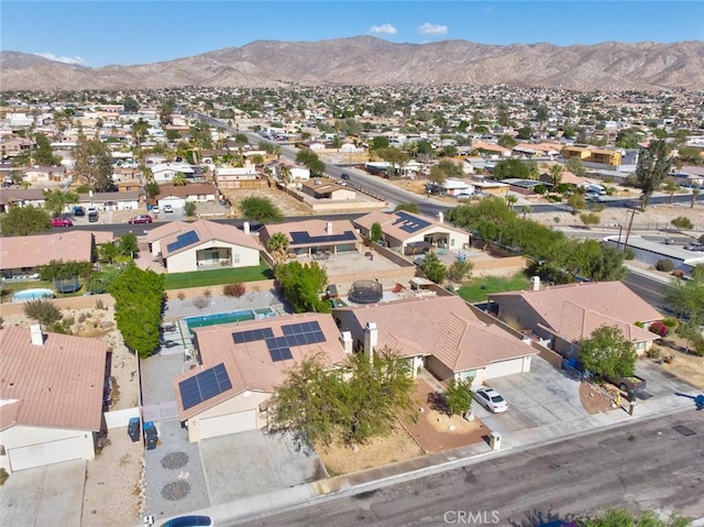 drone / aerial view featuring a mountain view