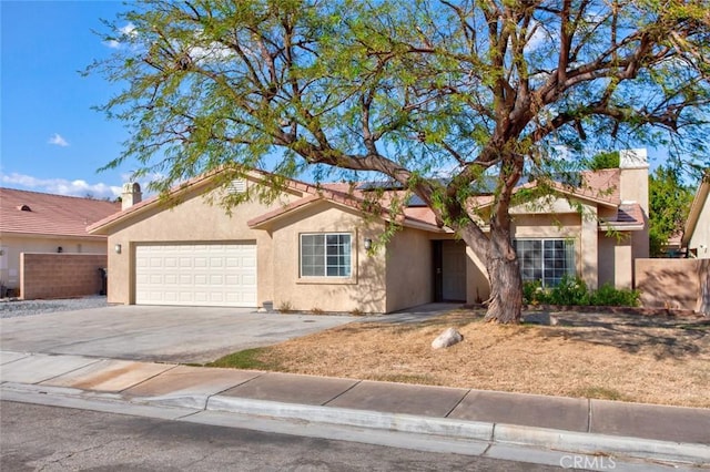 single story home with a garage