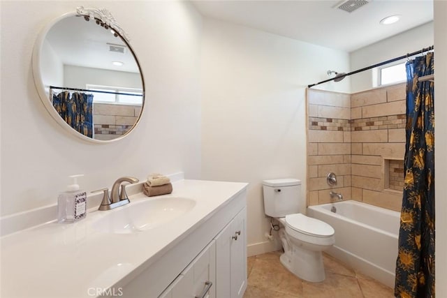 full bathroom featuring tile patterned flooring, shower / tub combo, vanity, and toilet