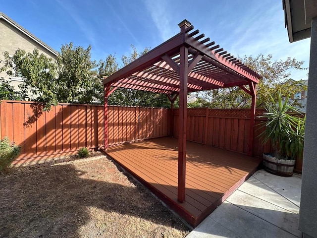 wooden deck featuring a pergola