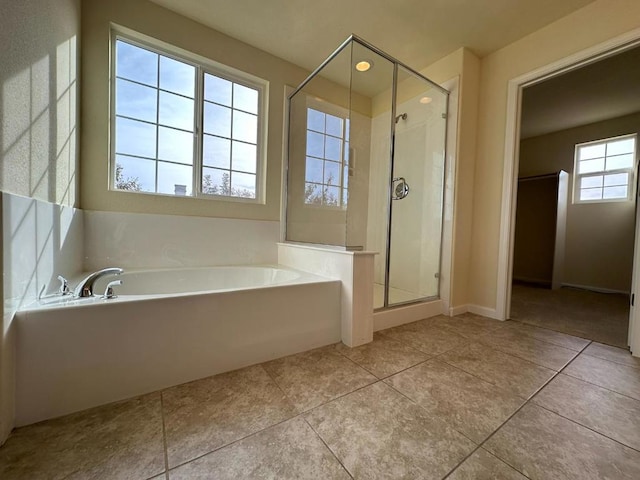 bathroom featuring independent shower and bath and tile patterned floors