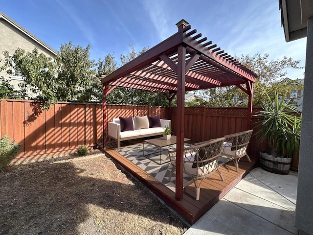 view of patio with an outdoor living space and a pergola