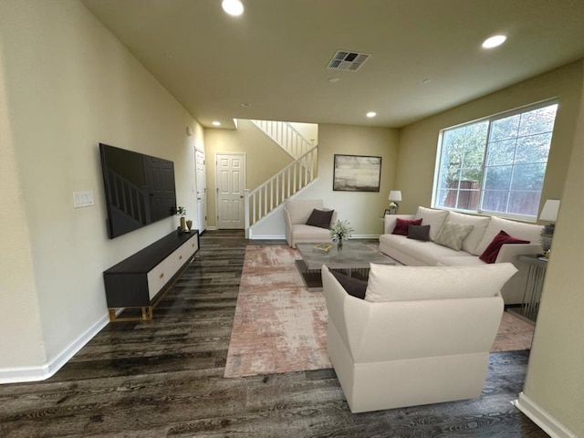 living room featuring dark hardwood / wood-style floors