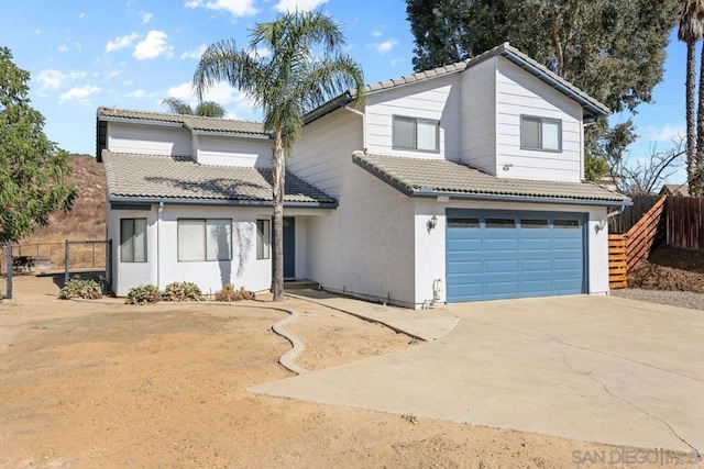 front of property with a garage