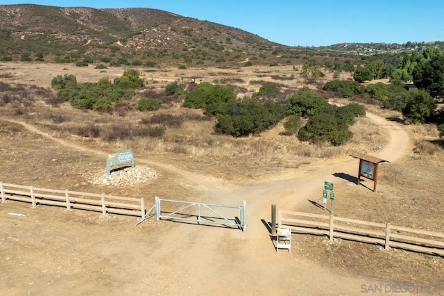 view of mountain feature with a rural view