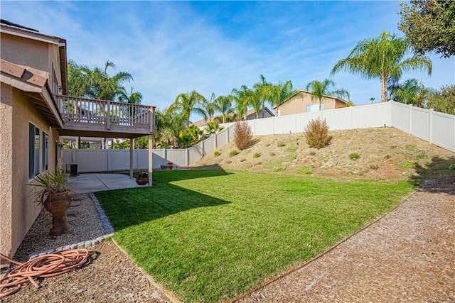 view of yard with a patio and a deck