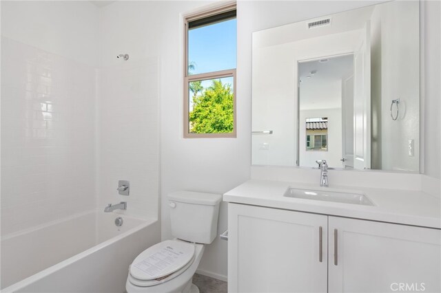 full bathroom featuring vanity, toilet, and shower / washtub combination