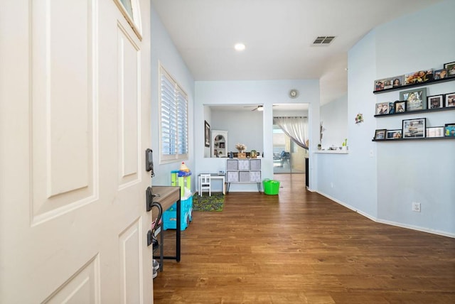 foyer featuring hardwood / wood-style floors and ceiling fan