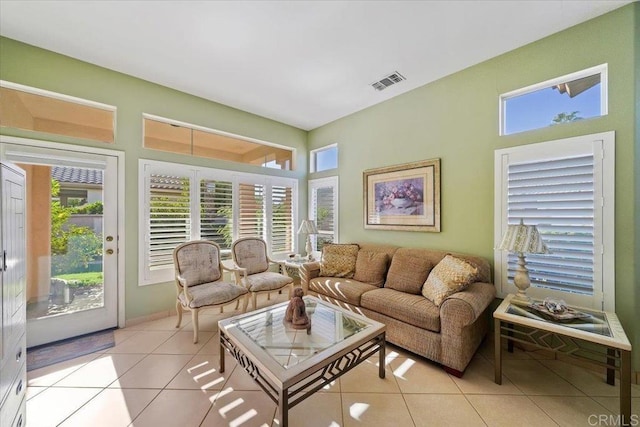 living room with light tile patterned flooring