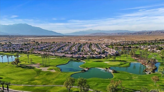 bird's eye view featuring a water and mountain view