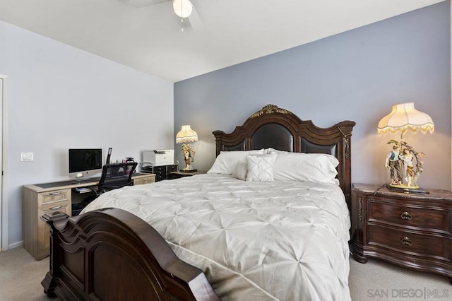 bedroom with ceiling fan and light colored carpet