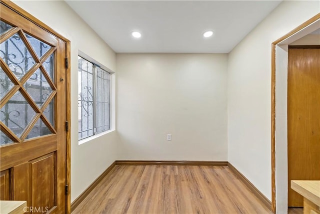 entryway with light hardwood / wood-style flooring