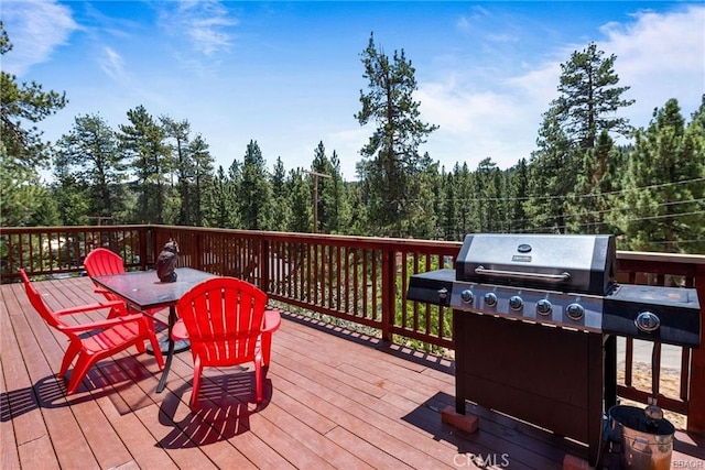 wooden deck featuring grilling area