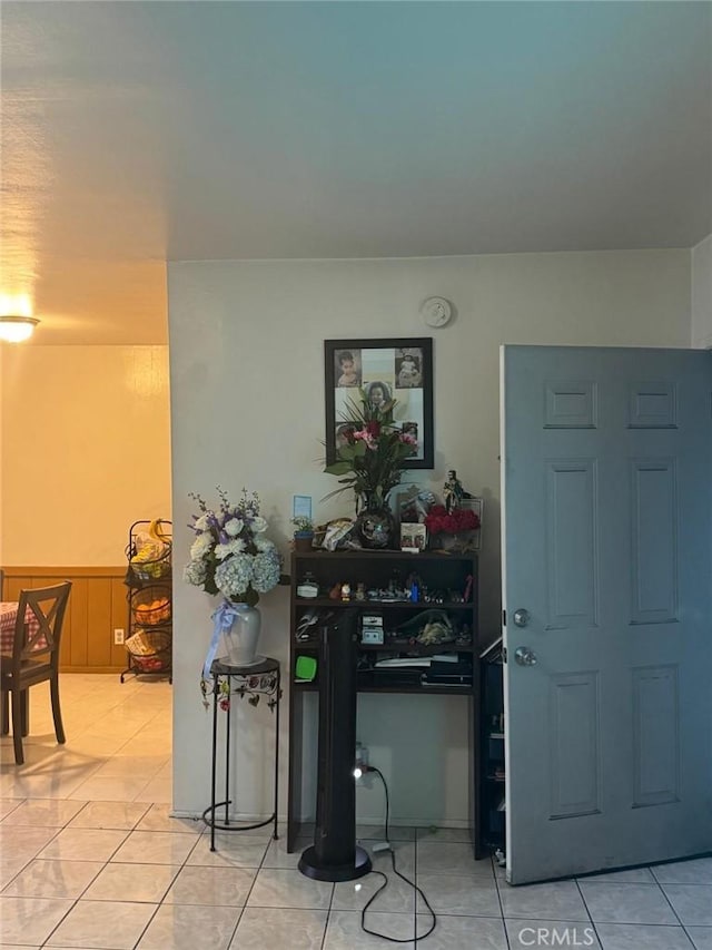 foyer entrance with light tile patterned floors