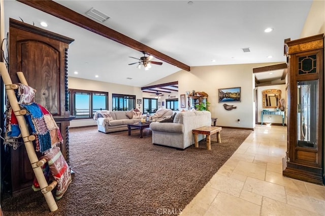 living room with ceiling fan and lofted ceiling with beams