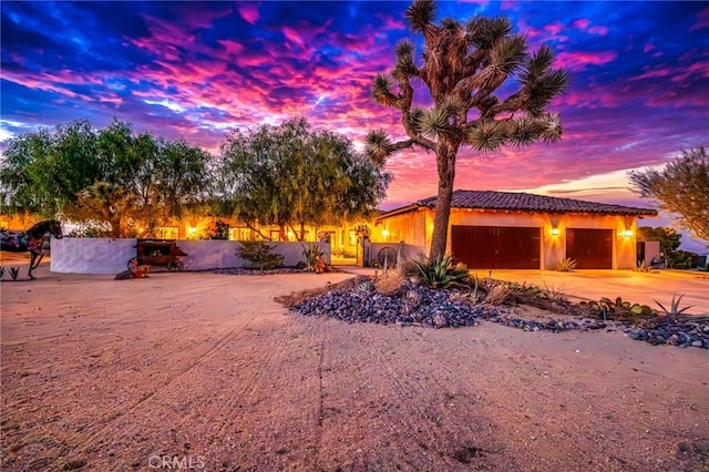 view of front of home with a garage