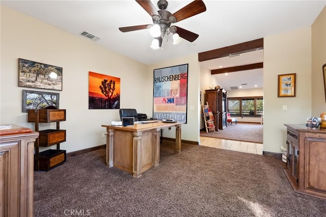 home office featuring ceiling fan and dark carpet