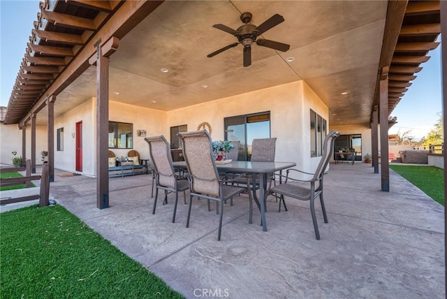 61138 Onaga Trl, Joshua Tree, CA 92252 - view of patio featuring outdoor dining space and a ceiling fan