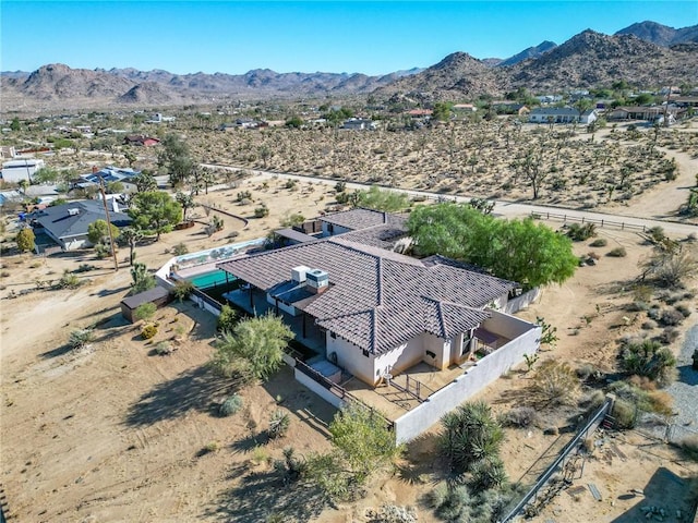 drone / aerial view featuring a mountain view