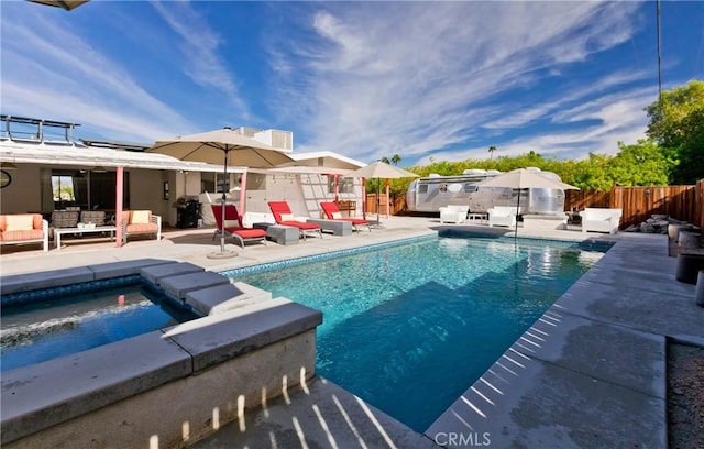 view of pool featuring an outdoor living space and a patio