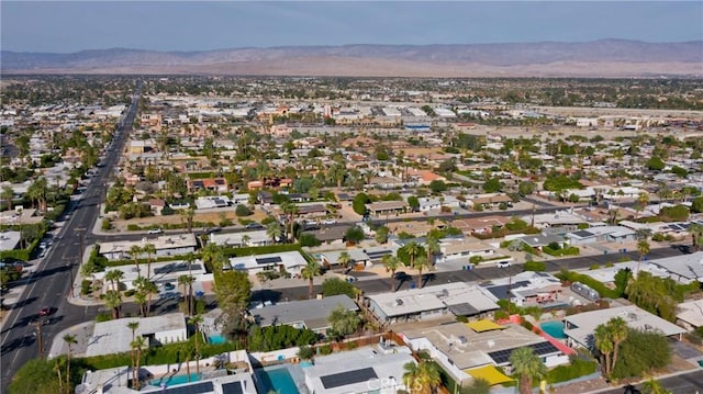 bird's eye view with a mountain view