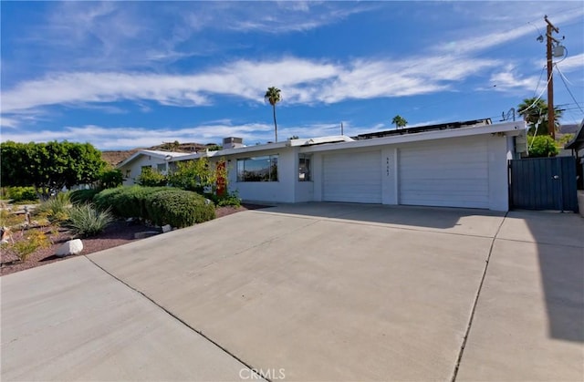 single story home with a garage