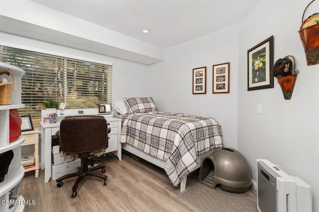 bedroom featuring light hardwood / wood-style floors