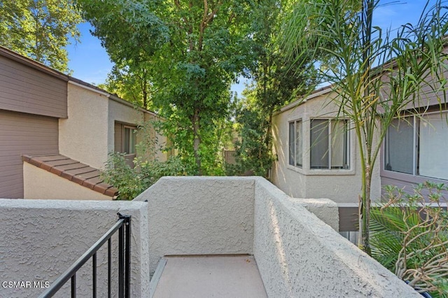 exterior space with a balcony