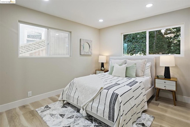 bedroom featuring light hardwood / wood-style floors