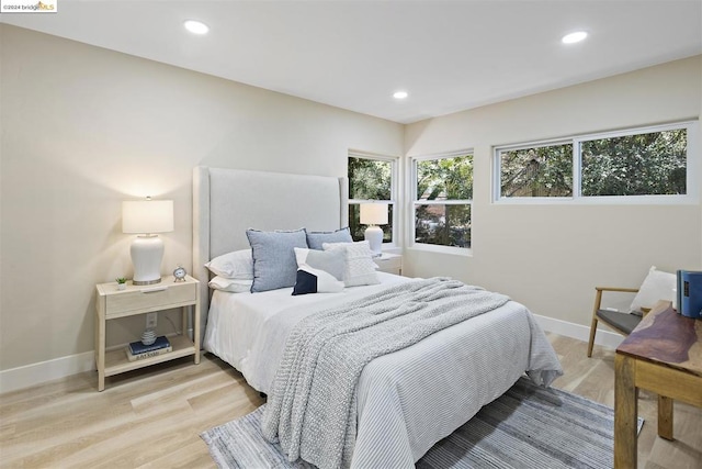 bedroom featuring light hardwood / wood-style floors