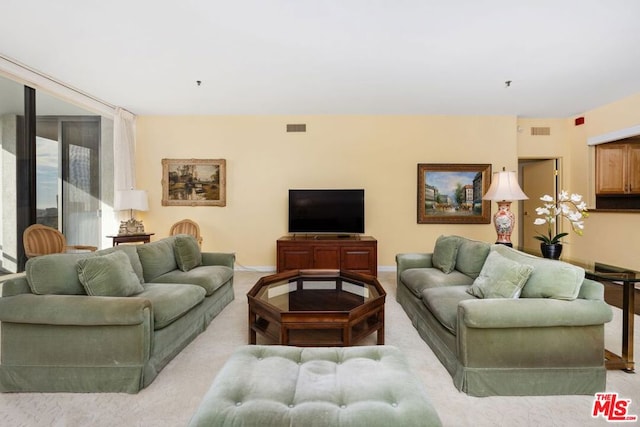 living room with light carpet