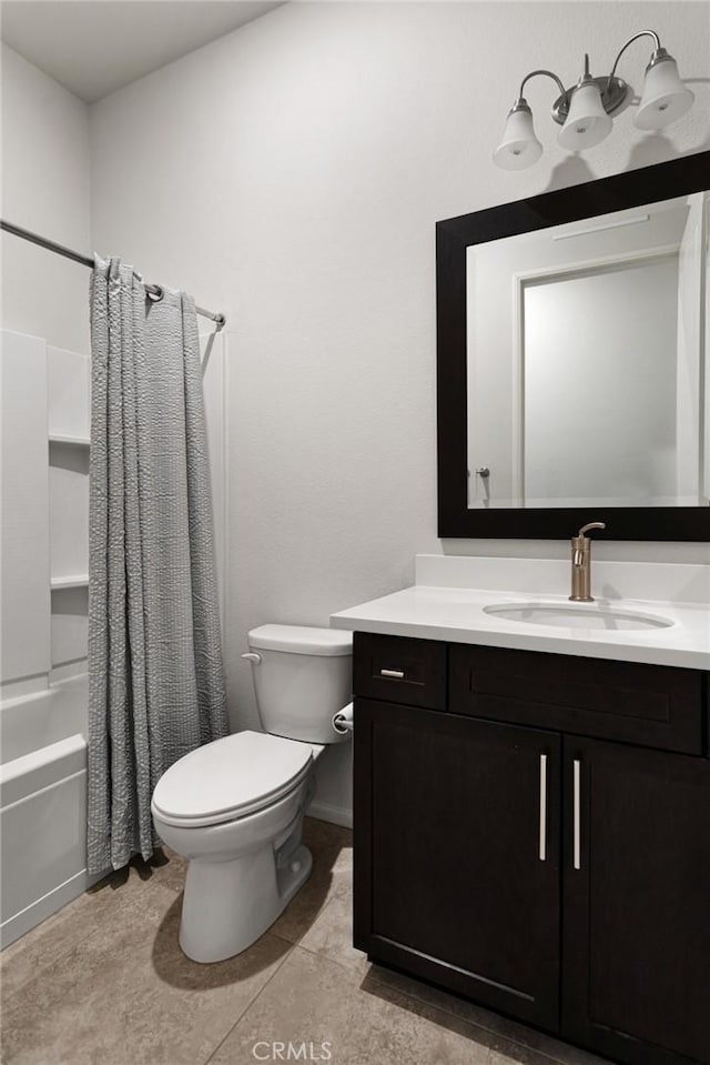 full bathroom with tile patterned floors, vanity, toilet, and shower / bath combo with shower curtain