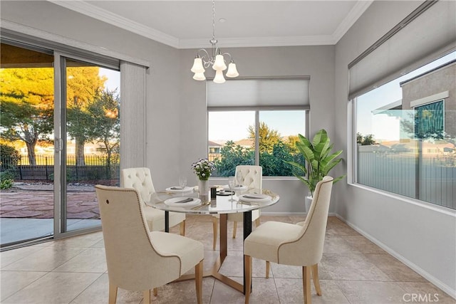 dining space with crown molding, plenty of natural light, and a chandelier