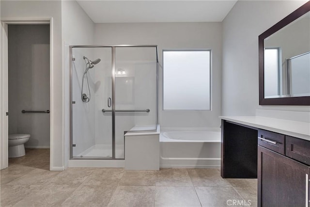 full bathroom featuring tile patterned floors, toilet, vanity, and shower with separate bathtub