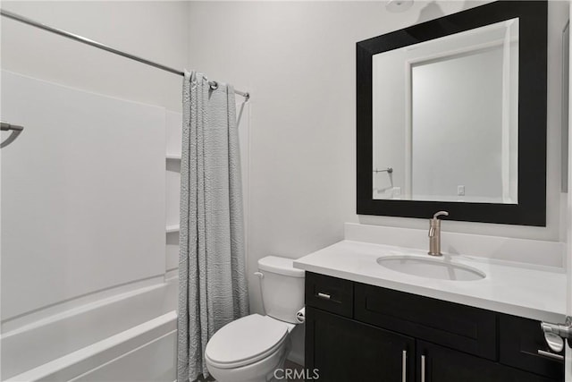 full bathroom featuring shower / bath combo, toilet, and vanity