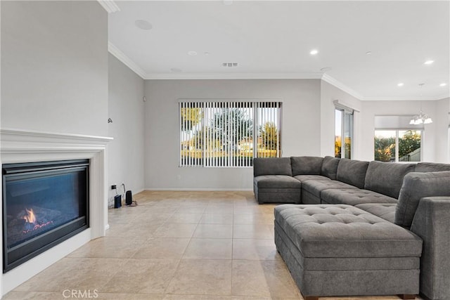 tiled living room with ornamental molding and a chandelier