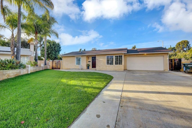 single story home featuring a front yard and a garage